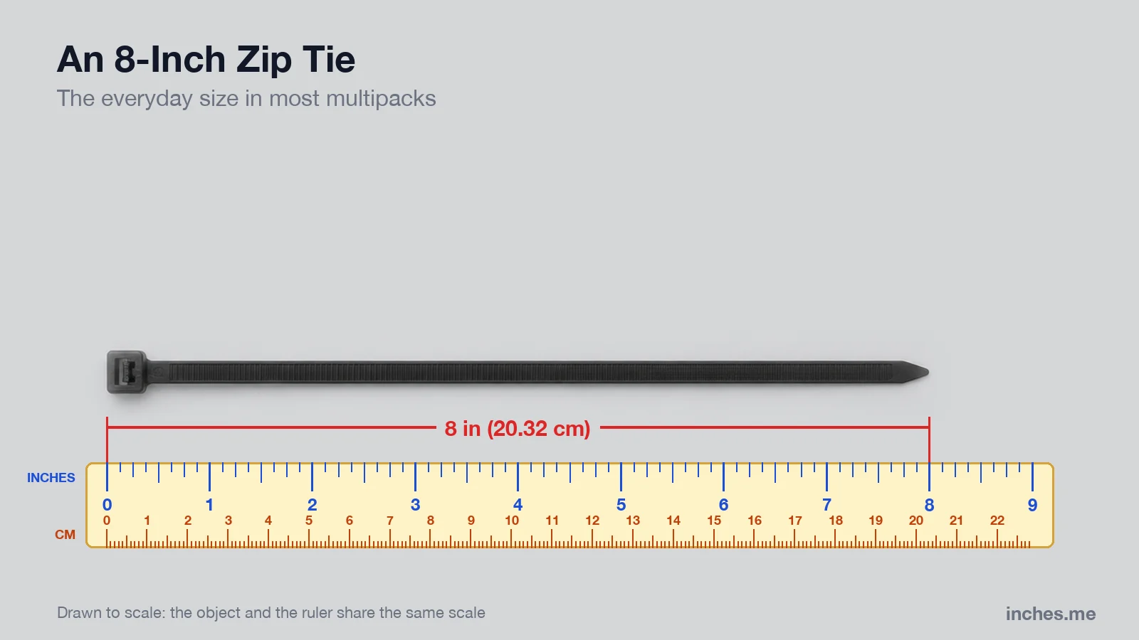 Black nylon cable zip tie lying straight above a ruler, 8 inches long